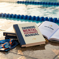 Swimming Mental Performance Manual book on a pool deck